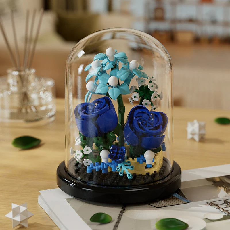 Dark and light blue eternal roses building block model in a glass dome