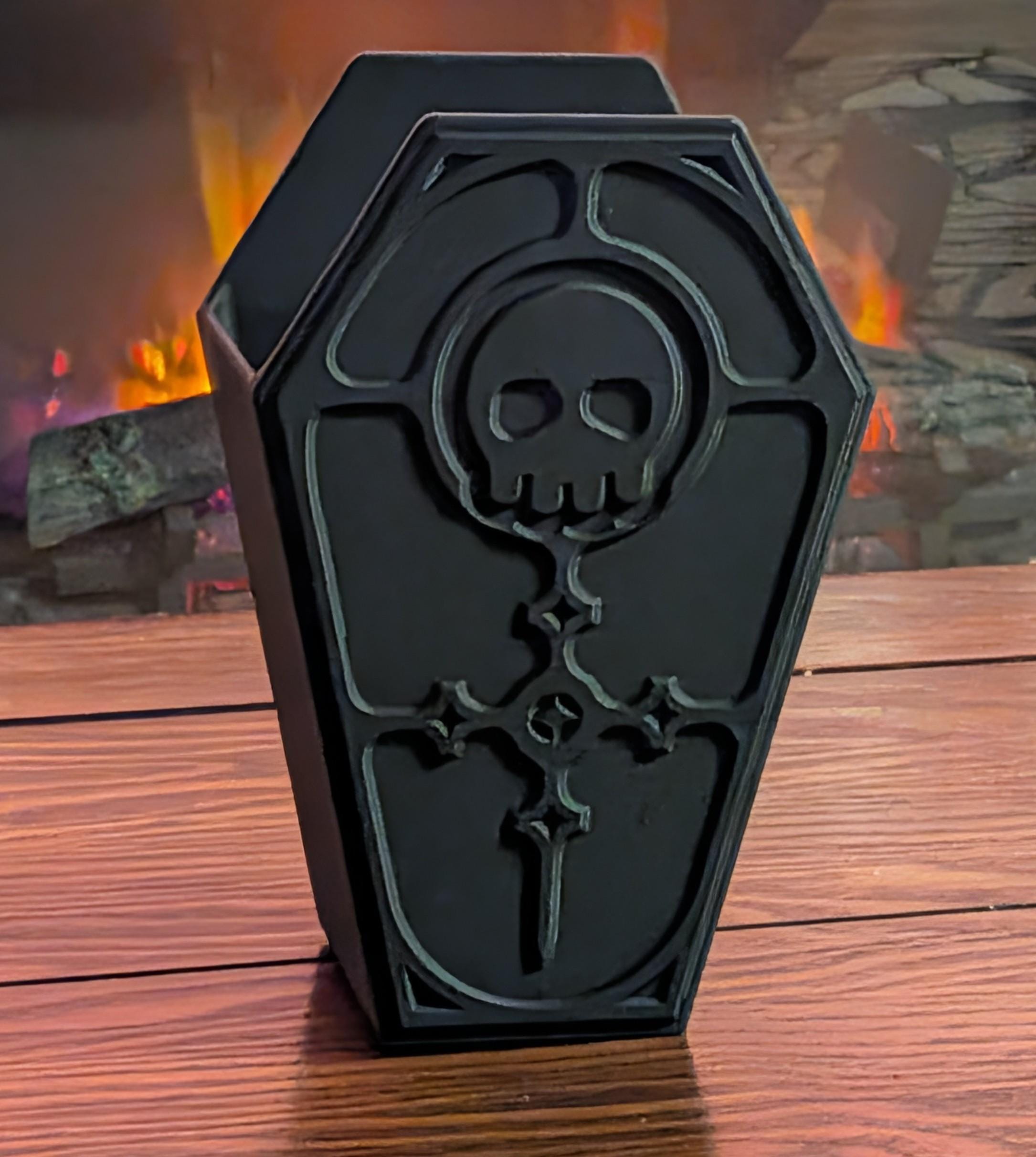 Luxury 3D printed coffin vanity organizer with intricate skull relief lid in matte charcoal black.